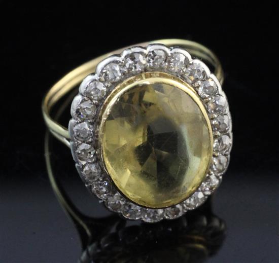 A gold, citrine and diamond ring, size G.